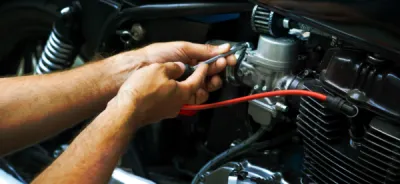 Entretien de moto toutes marques avec vidange et révision dans un atelier moto professionnel à Luzinay près de Vienne