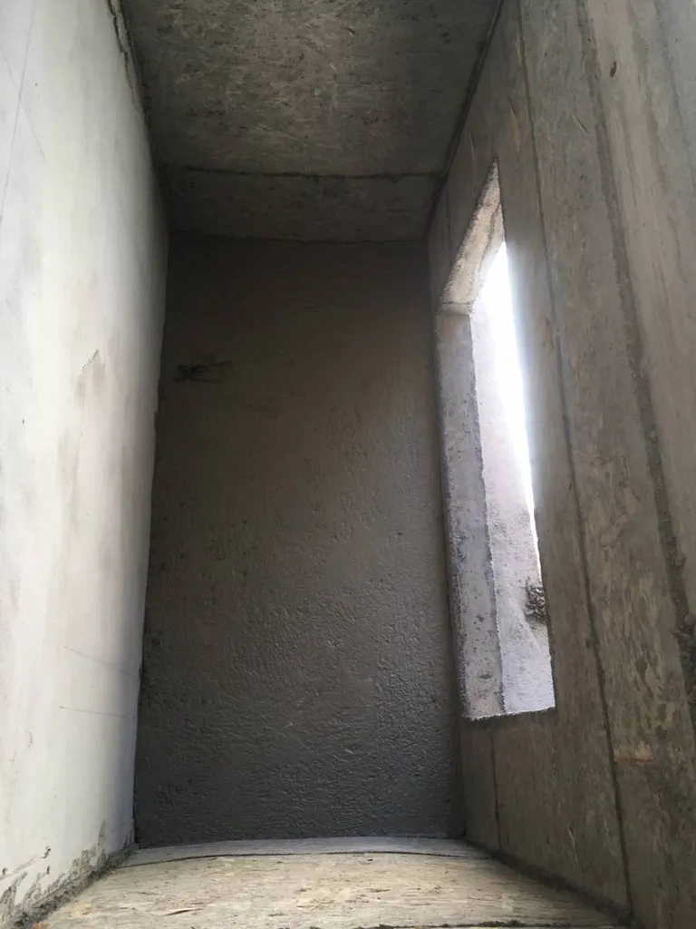 Réalisation d'une cheminée en béton dans une maison neuve à Salon de Provence