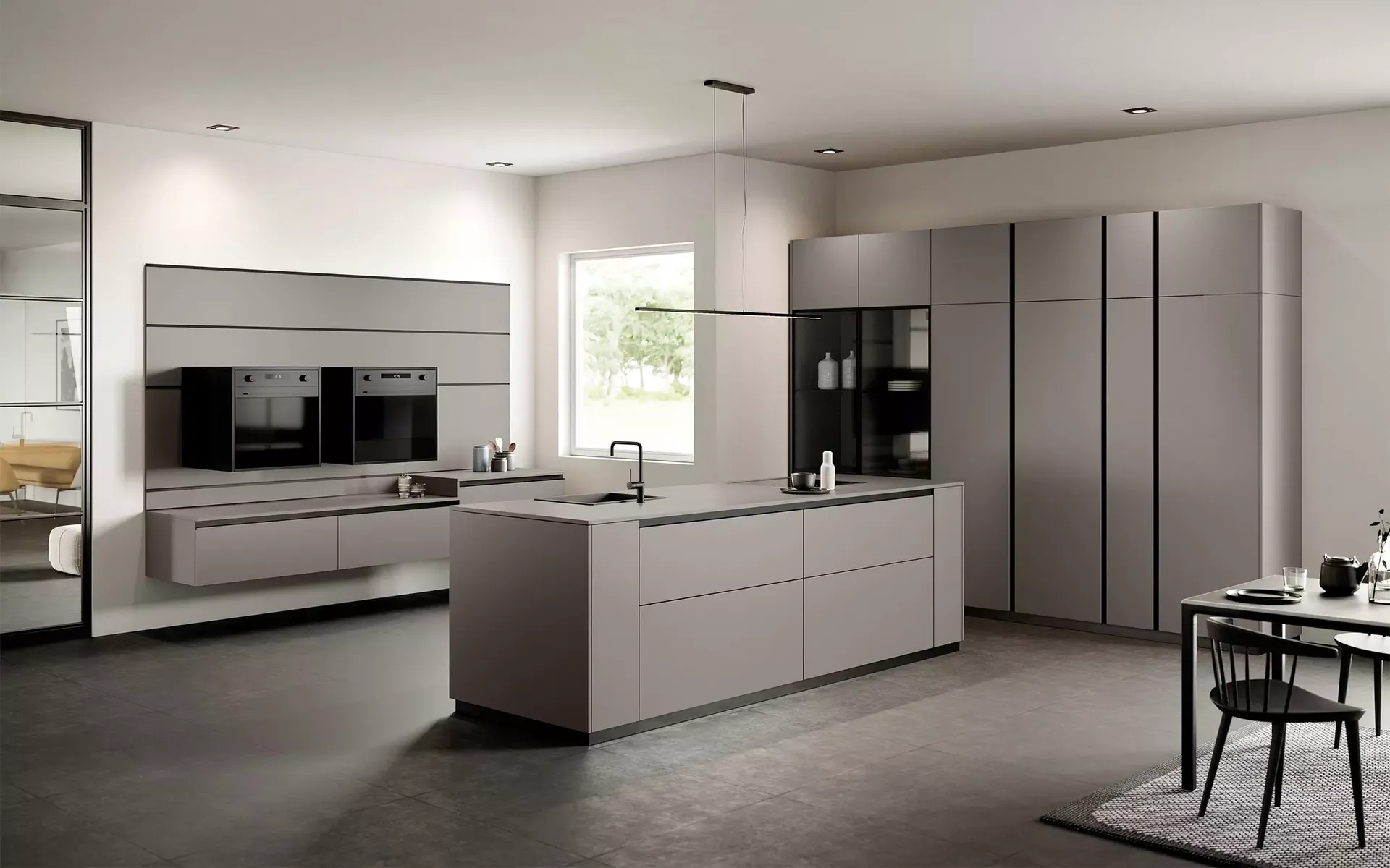 Cuisine design grise sans poignées avec des meubles suspendus pour un intérieur original et différent en Haute Garonne