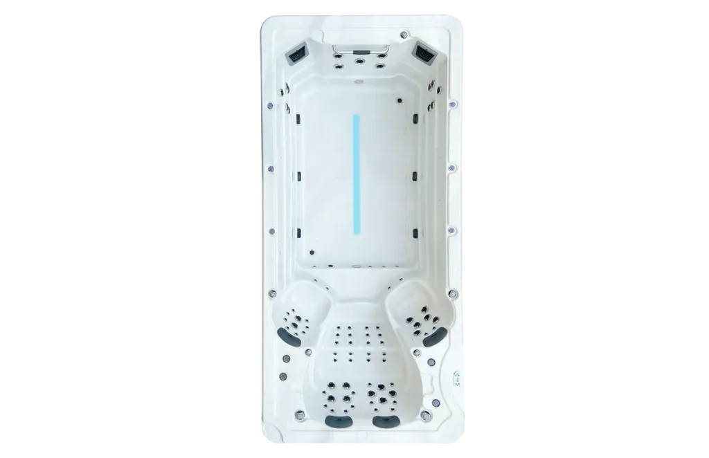 Vue de dessus du spa de nage BE SPA Jade montrant la zone de nage et les buses d’hydromassage