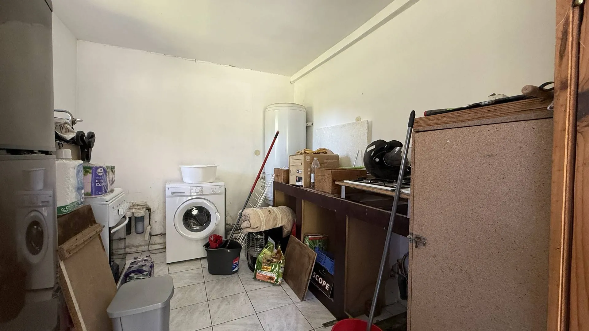 Maison avec terrain et garages à vendre à Saint-Hellier – idéal résidence principale ou secondaire