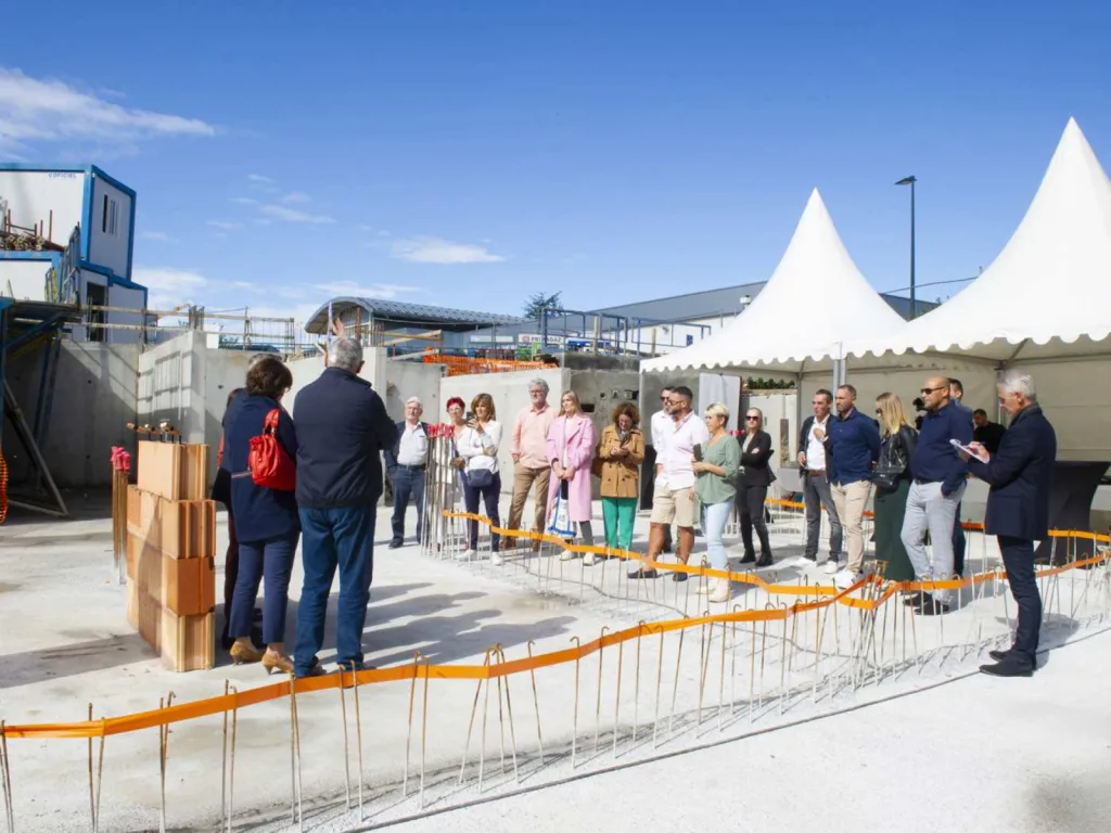 Photographe Pose de Première Pierre 