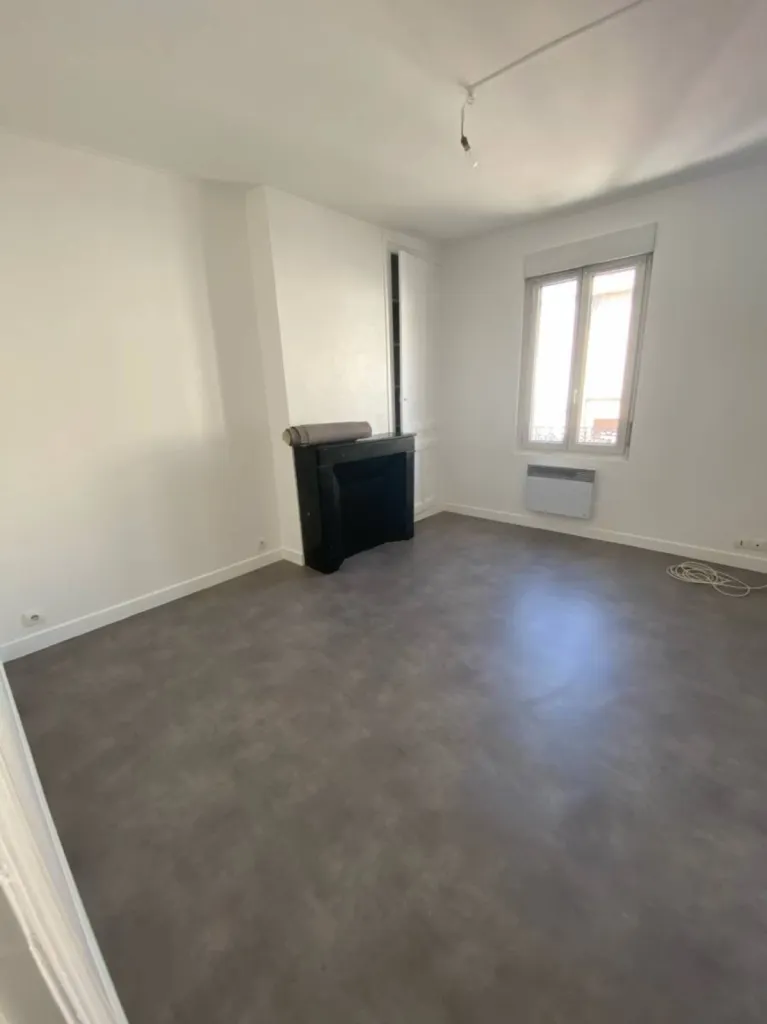 Pose d'un sol Lino effet béton dans un appartement au Havre