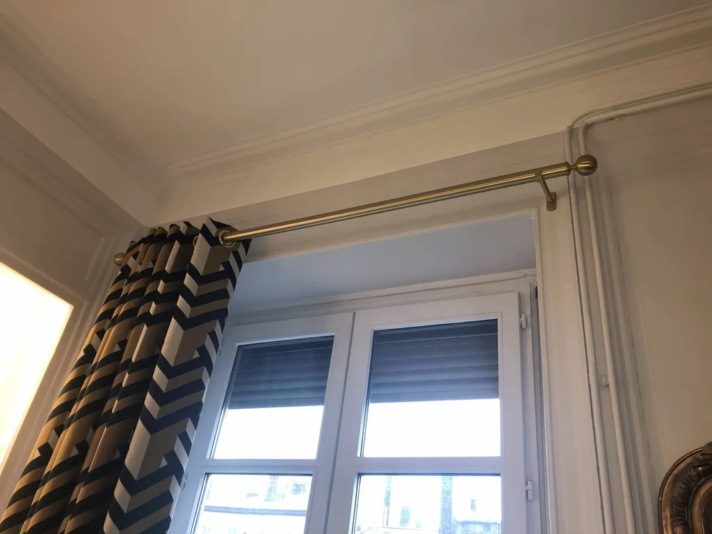 Confection de double rideaux en tête à œillets sur-mesure pour un appartement à Lyon 6