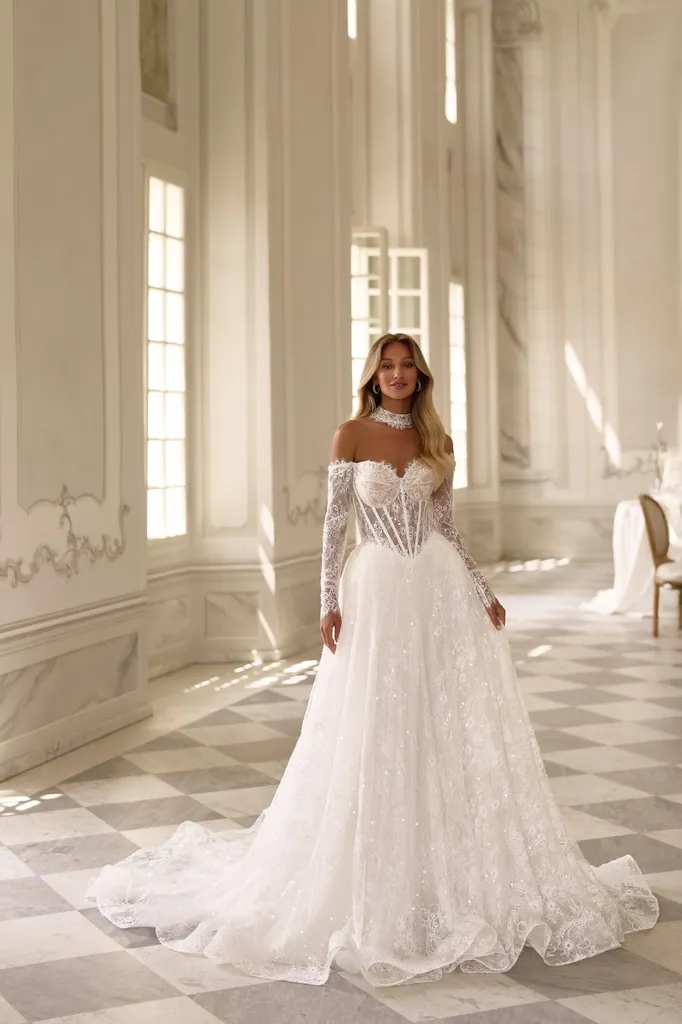 Robe de mariée trapèze avec manches longues Marseille