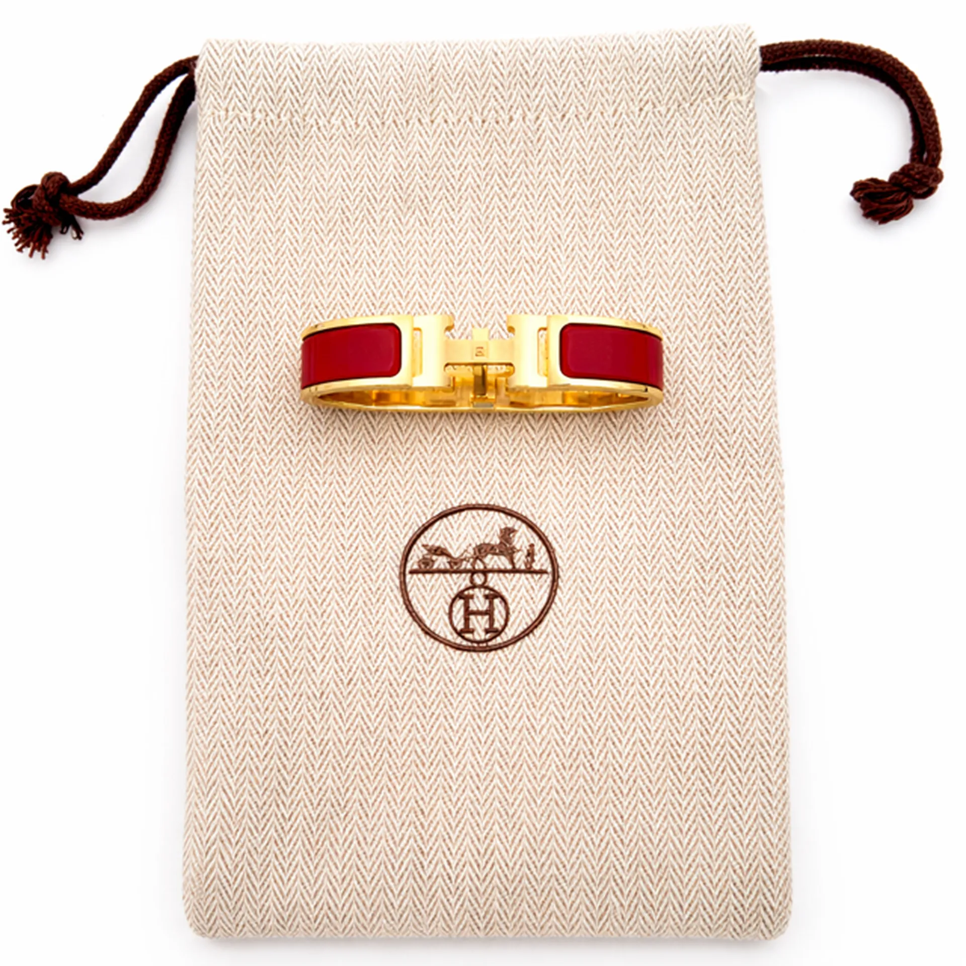 Bracelet Hermès Clic Clac H en métal doré et émail rouge quasi neuf diamètre 55 mm dépôt vente Or Ligne Bassin d’Arcachon