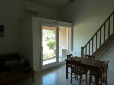 baie vitrée coulissante PVC/aluminium à translation