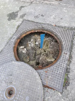 Débouchage d'un siphon disconnecteur ( regard plein ) pour un syndic de copropriété à Marseille 13003.