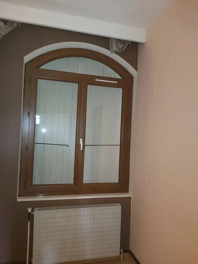 Changement d'anciennes menuiseries extérieures en bois par du PVC à Lyon