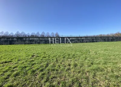 A vendre à Le Pecq  Quartier Cité une charmante maison familiale lumineuse de 138m2 avec un grand terrain de 1080m2 et 2 garages