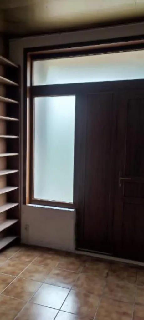 Pose d'une porte d'entrée en PVC imitation bois, haute performance avec châssis vitrés Premium Ouvertures à le Vaudioux dans le Jura