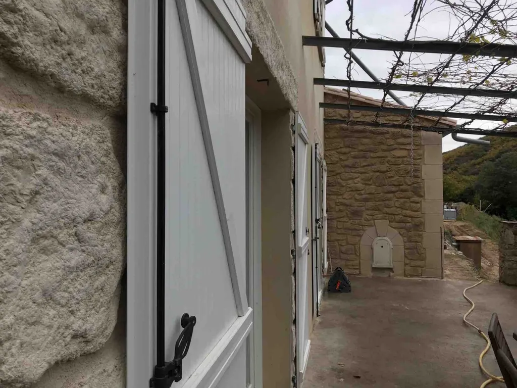 facade en pierre sur bâtisse existante avec extension à Taleyrac dans le Gard proche de Valleraugue et de Ganges 