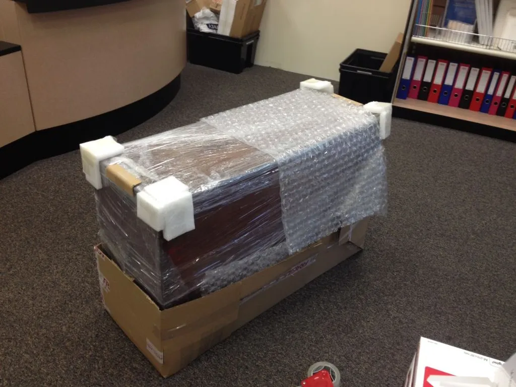 Emballage d'une malle ancienne de collection à Lyon