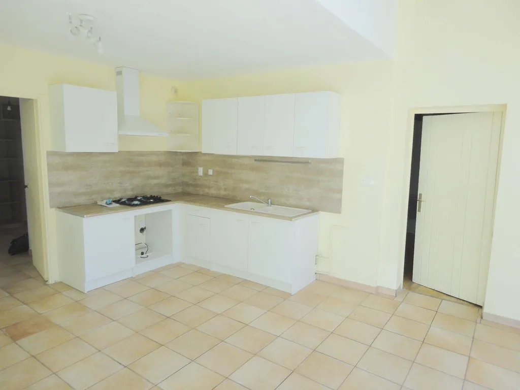 maison proche commerces