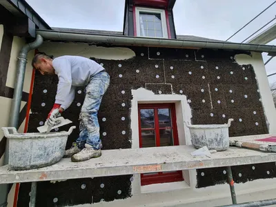 Isolation thermique par l’extérieur des murs en liège près de Le Neubourg (Eure)
