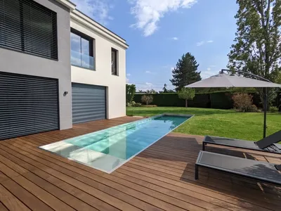 Réalisation d'un couloir de nage en inox de 3x12m avec skimmer miroir avec longueur de piscine à Dardilly près de Lyon