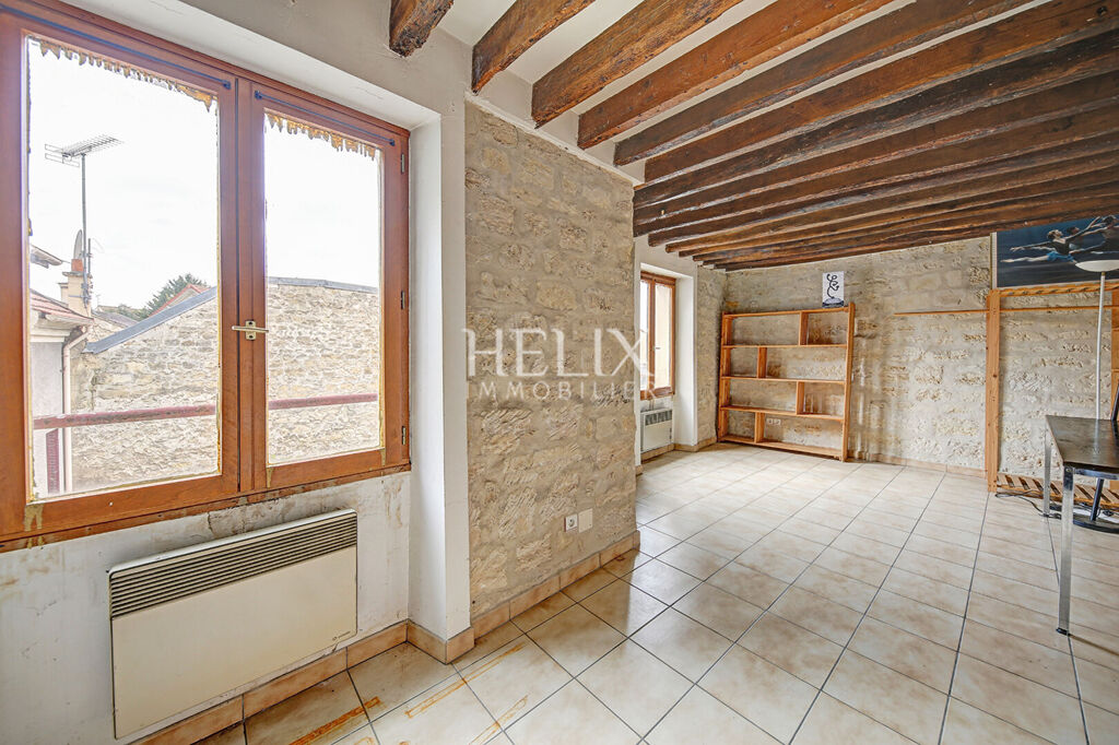 Immeuble à Vendre dans le centre ville de Montesson avec deux commerces