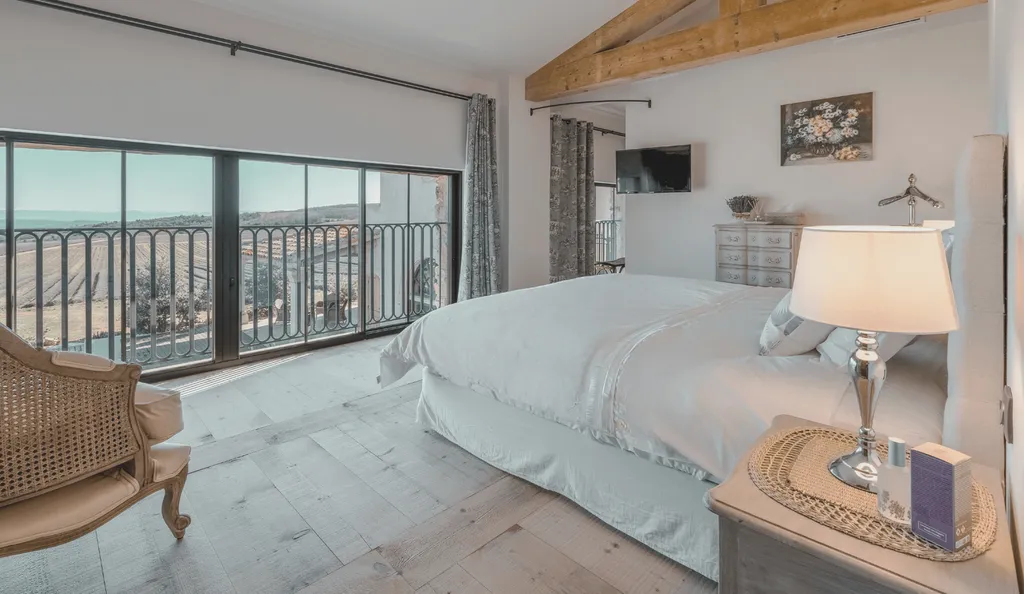 The Marius Deluxe Room : A serene and elegant Provence sanctuary blending generous space, refined décor and soothing comforts for an unforgettable stay