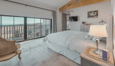 The Marius Deluxe Room : A serene and elegant Provence sanctuary blending generous space, refined décor and soothing comforts for an unforgettable stay