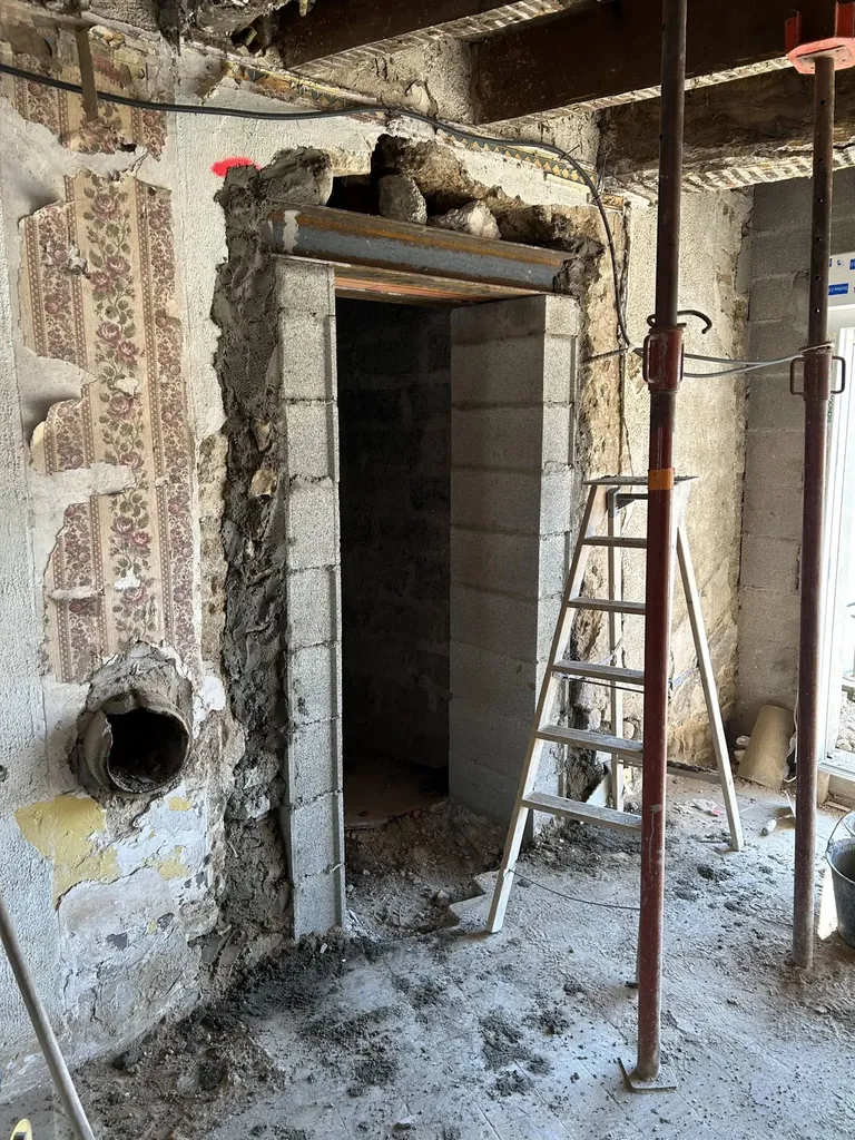 Ouverture d’un mur porteur pour réunir deux anciennes maisons de ville