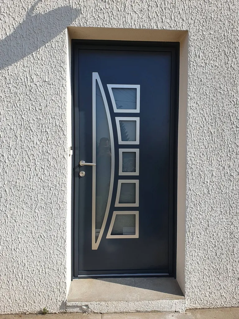 remplacement d'une porte d'entrée à Jassans riottier pres de trévoux