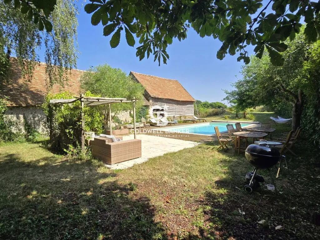 acheter une maison de campagne avec une piscine et un grand terrain