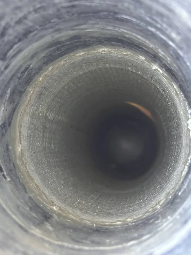 Réparation de canalisation au packer sur une casse localisée dans un bâtiment industriel à Montélimar