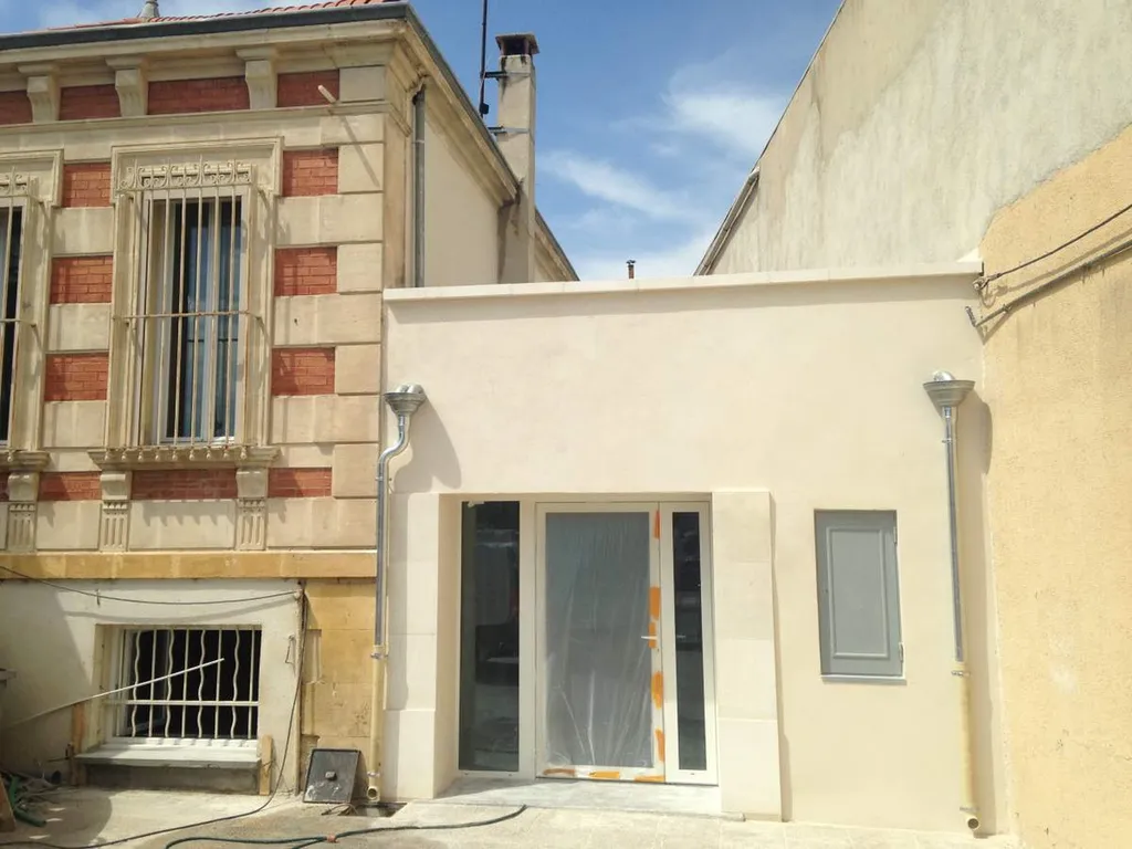 Rénovation d'un local commercial Salon de Pce - façade après travaux