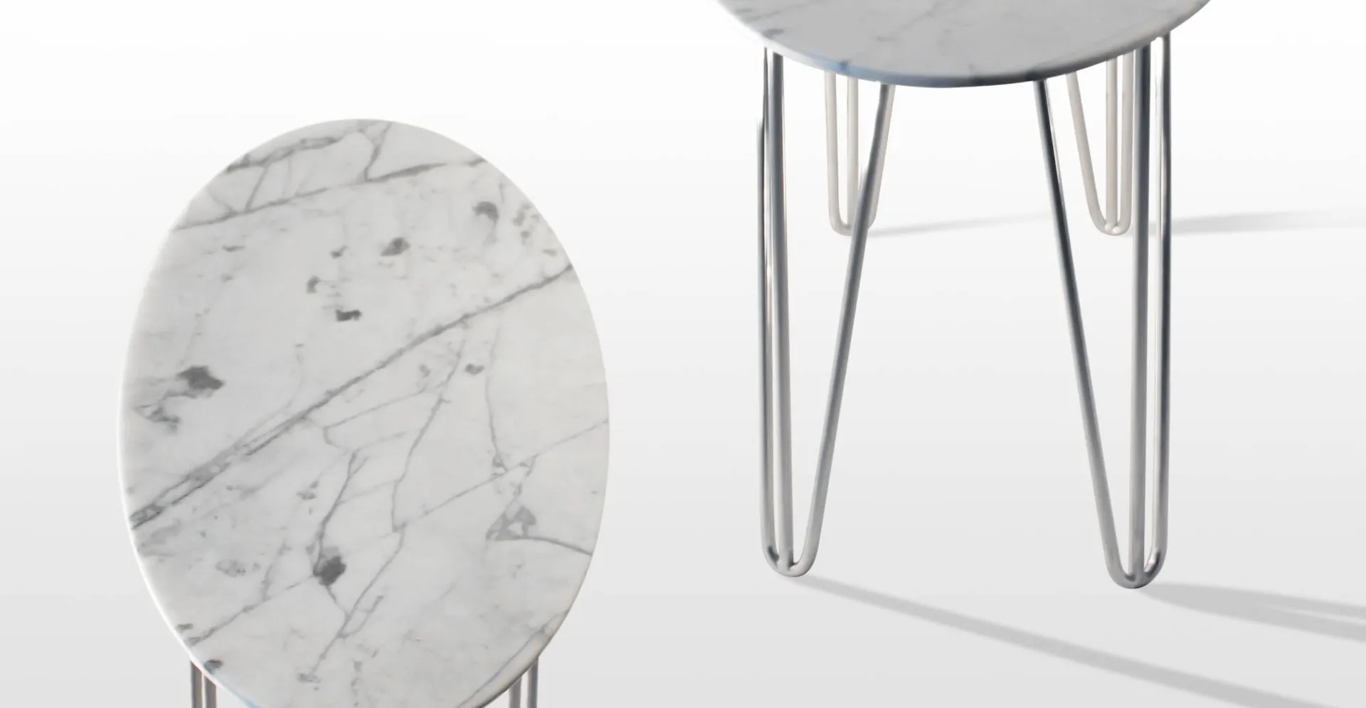 Selma: table basse ovale design vintage en marbre blanc calacatta, pieds tête d'épingle acier chromé