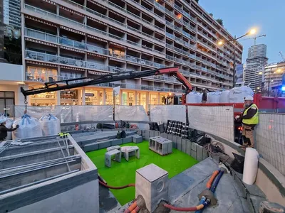 Approvisionnement de substrat allégé à la grue à Monaco