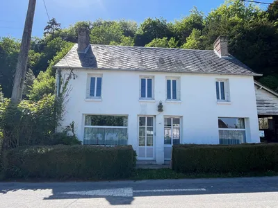 A vendre : maison de caractère en bon état général située à Heurteauville en bord de Seine