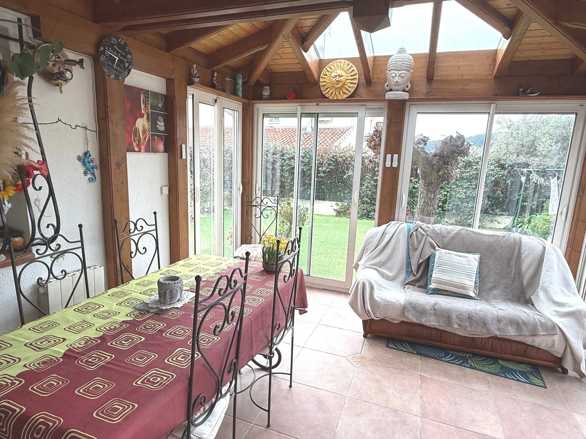 Cuisine donnant sur une véranda de 14m²