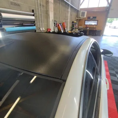 Covering carbone 3M satin sur toit et antenne de BMW M3 E92 à Clermont-Ferrand