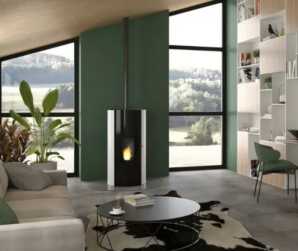 Jotul PF 925 S blanc et noir sur un fond vert encadré de belles baies vitrées