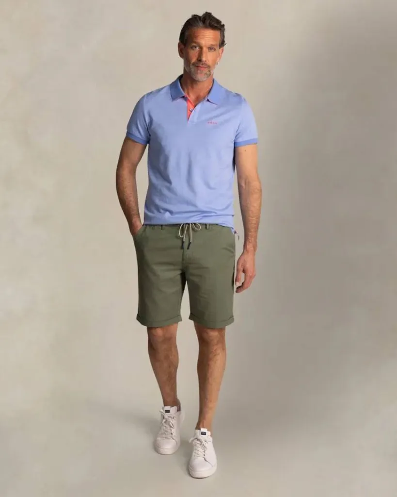 Polo NZA New Zealand Auckland Bleu Clair Détails Orange à Dieppe 76 chez Urban Chic