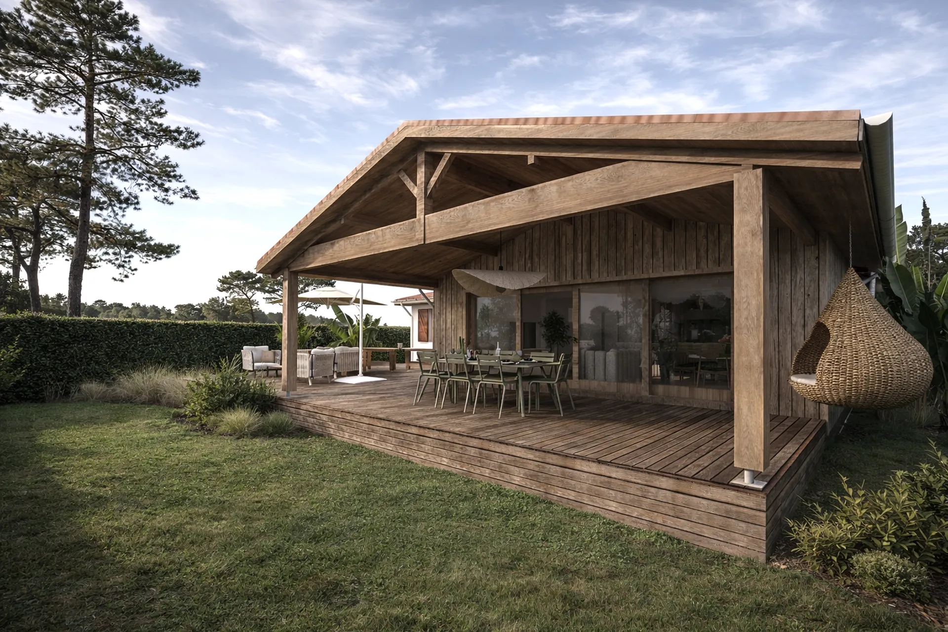 AKIKO Architecture — ORÉE, Lachanau (Hourtin) Extension en ossature bois avec terrasse et pergola ouverte sur le jardin, créant une continuité naturelle entre le séjour et l’extérieur.