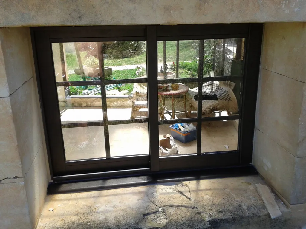 fenêtre coulissante 2 vantaux en aluminium