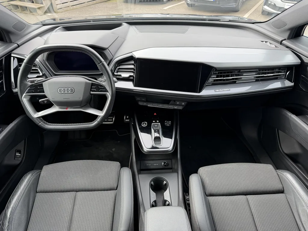 Audi Q4 e-tron d'occasion S-line 204 ch disponible chez votre concessionnaire à La Frénaye, proche Le Havre