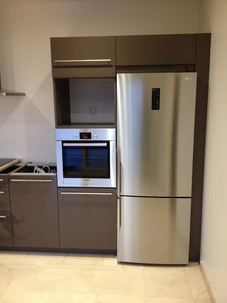 Installation de l’électroménager lors de la rénovation complète d’une cuisine à Collonges-au-Mont-d’Or (Rhône – 69)