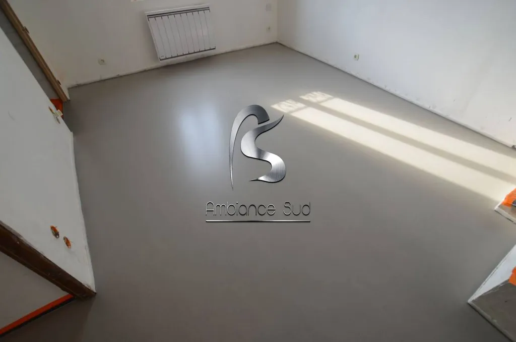 SOL EN COUCHE D'USURE TEINTE A BOUC BEL AIR