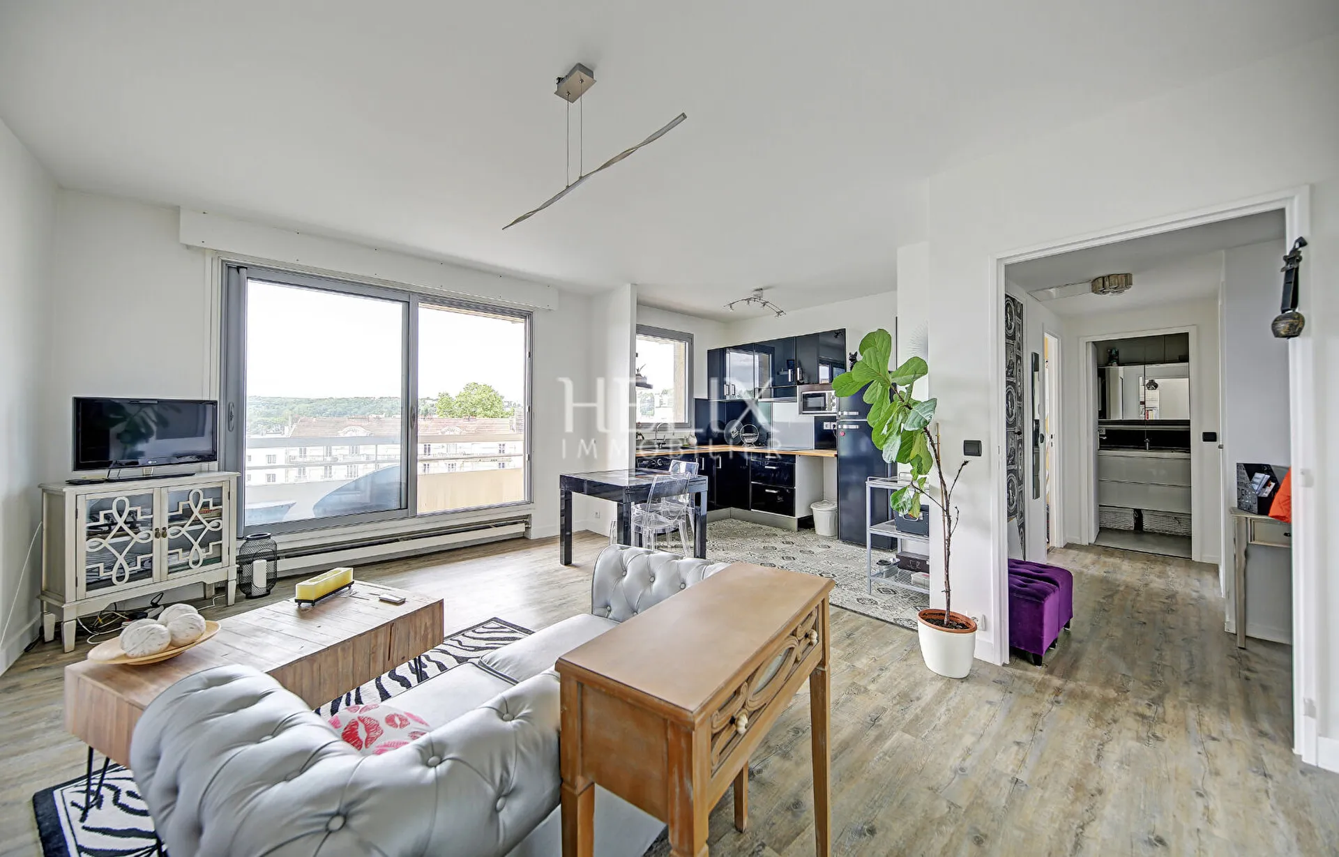 Magnifique 2 pièces au dernier étage avec balcon vue Seine