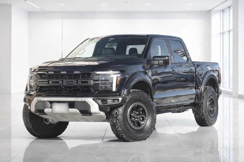 Ford F-150 Raptor noir – face avant pickup exposé en showroom Bordeaux