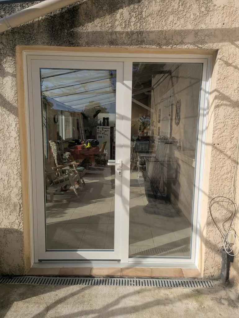 porte Aluminium avec châssis fixe latéral