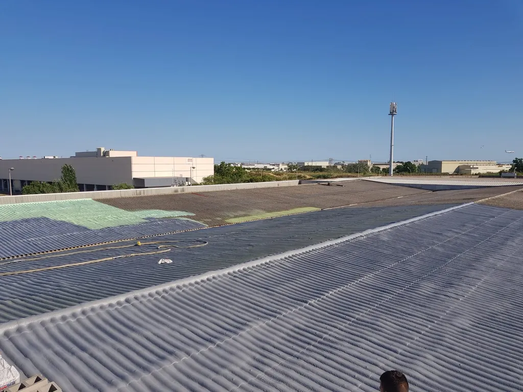 Intervention Optimum Bat : infiltration chronique dans un atelier municipal à cause d’un chéneau sous‑dimensionné