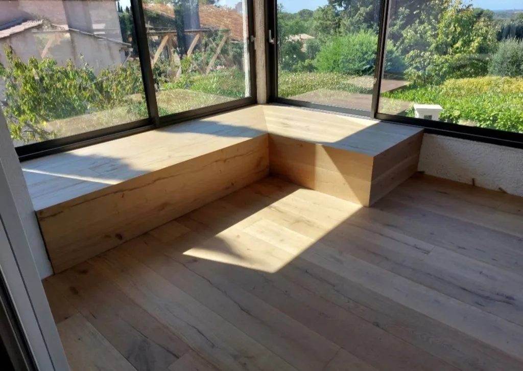 Transformation d’une véranda à Six-Fours-les-Plages, proche de Toulon, grâce au parquet Carcassonne Lamett, en région PACA