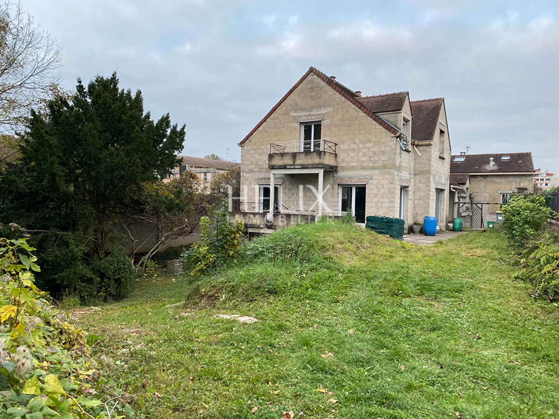 Terrain avec 2 maisons - Investisseurs