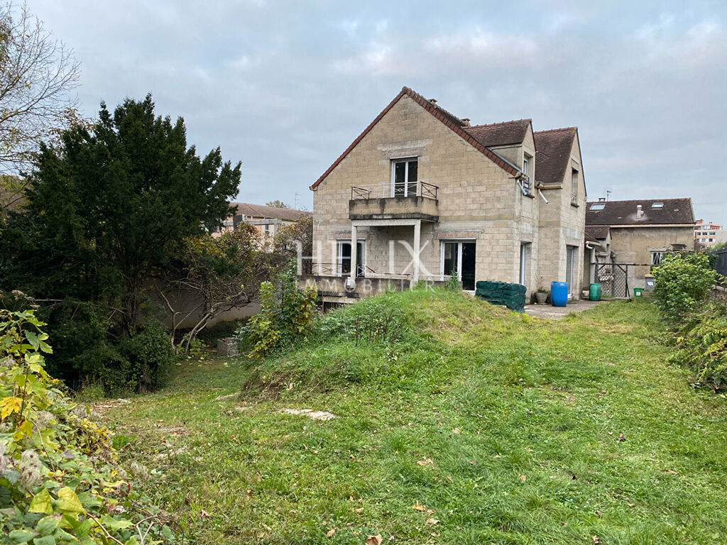 Terrain avec 2 maisons - Investisseurs