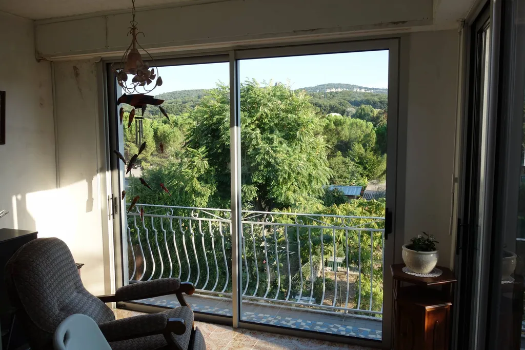 Coulissant deux vantaux en aluminium anodisé 