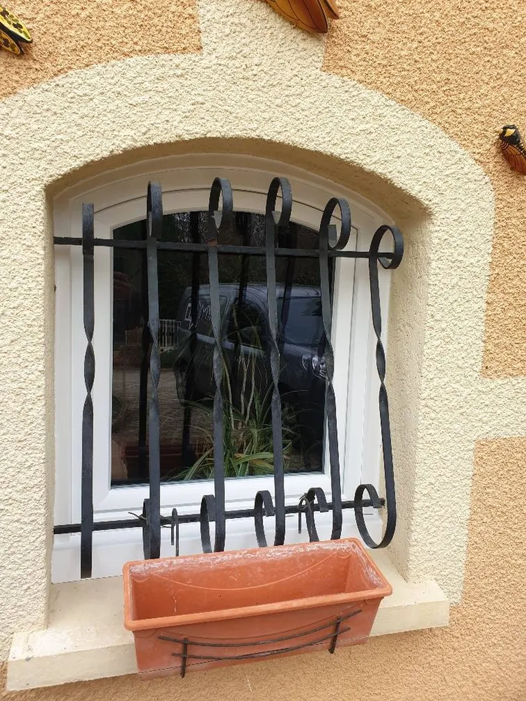 fenêtre cintré en PVC blanc