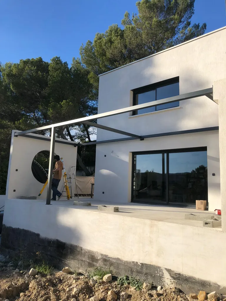 Pergola acier en porte à faux maison moderne Bouc Bel Air